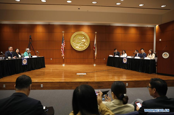 Image of Lt. Governor Kounalakis discussing agriculture and foreign trade policy with the Chinese consulate and state legislators.