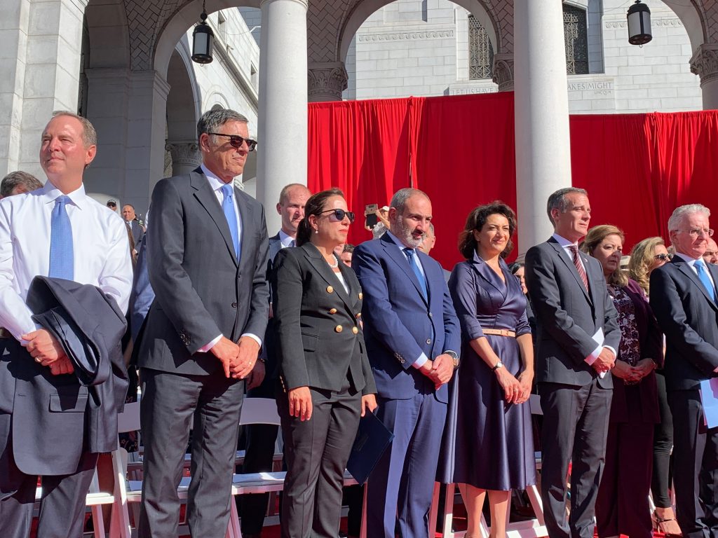 Lt. Governor Kounalakis and her husband stand on the stage with Armenian Prime Minster and other dignitaries