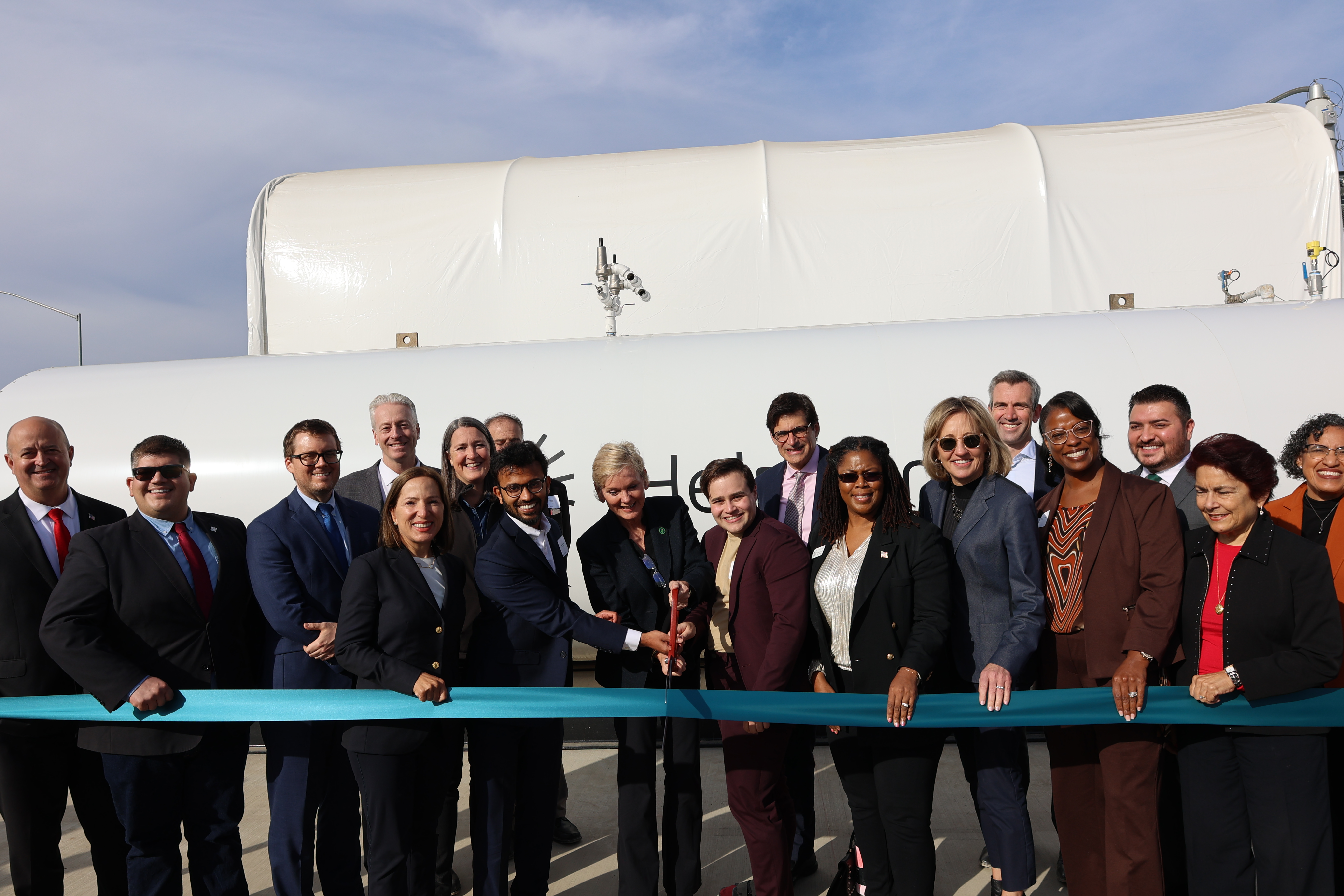 Image of officials and ribbon cutting ceremony