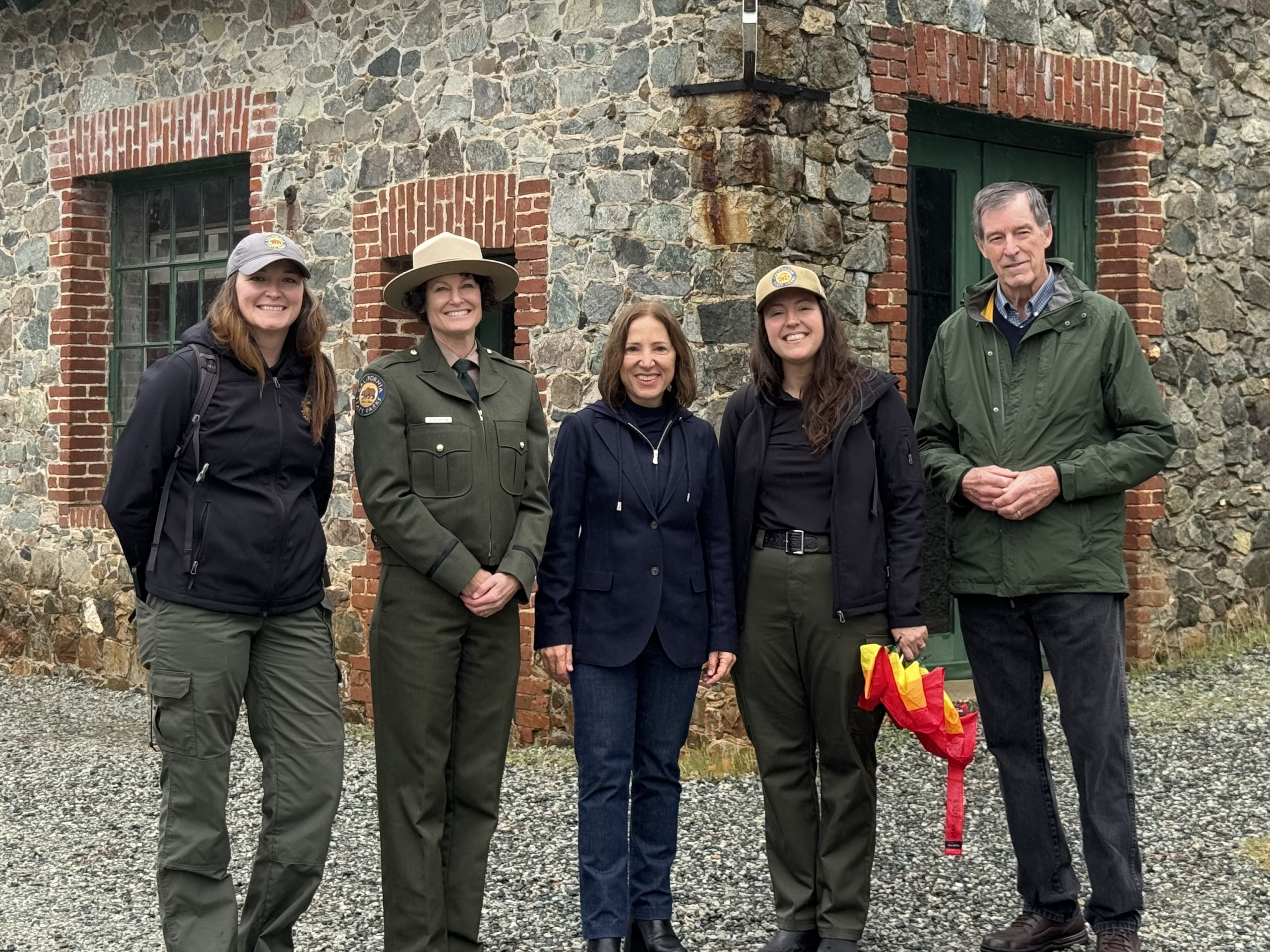 Image of Lt. Governor Kounalakis and representatives from Empire Mine State Park