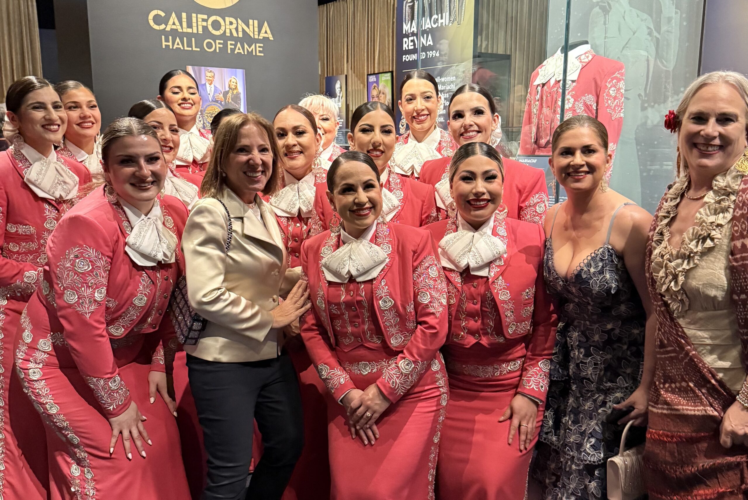 Image of Lt. Gov. Kounalakis with the Mariachi Reyna de Los Ángeles band at the CA Hall of Fame Event.