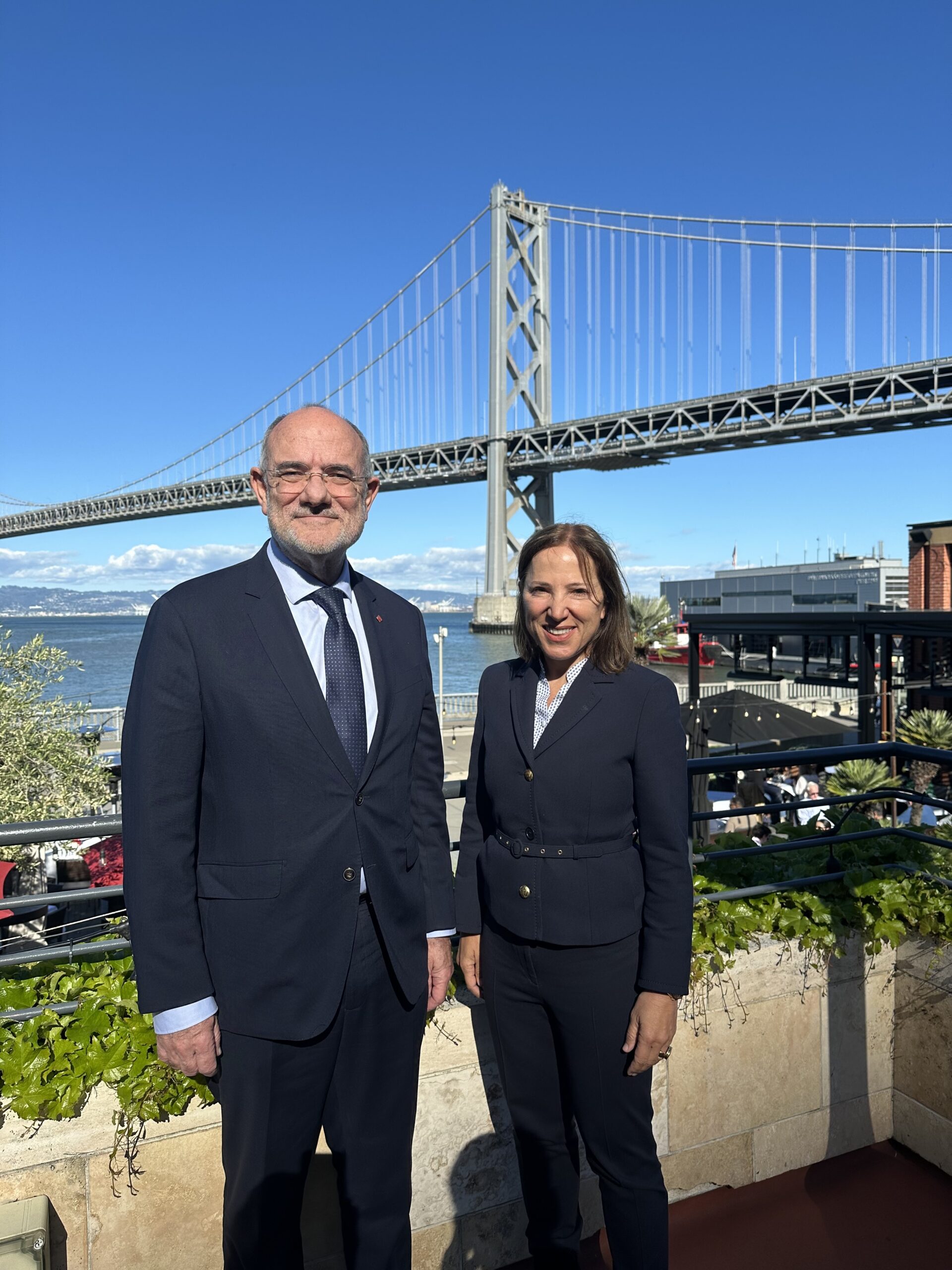 Image of Lt. Gov. Kounalakis with Catalan Governor with the Bay Bridge behind them.